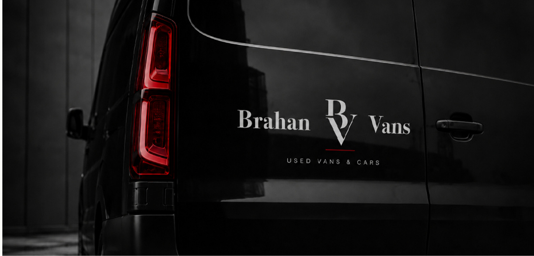 Brahan Vans logo applied to the rear of a black van
